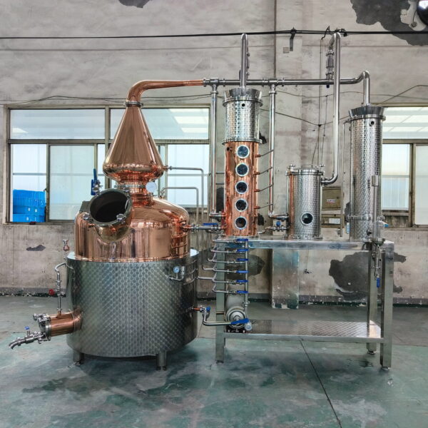 A large 1000-liter still used for distillation, with intricate copper piping, visible heating elements, and a sleek, industrial design. The still stands prominently in a clean, well-lit distillery environment, showcasing its scale and craftsmanship